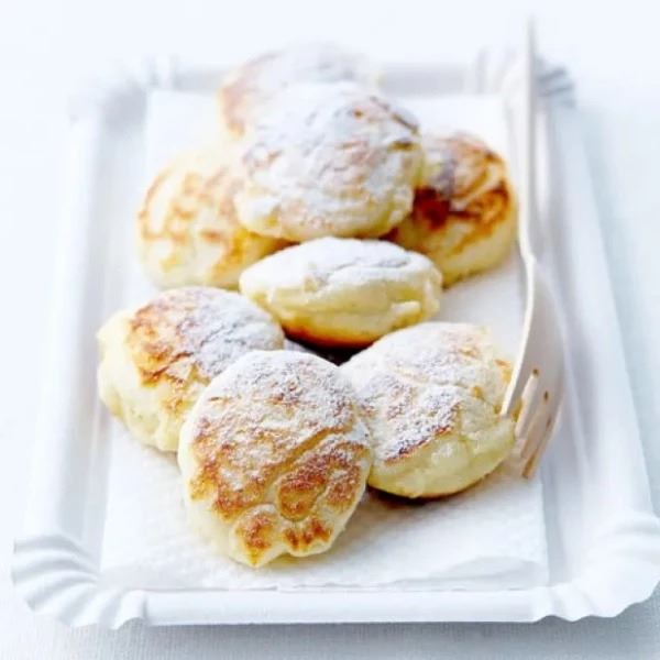 Complete poffertjesmix-set van Happy Rent Poffertjesmix met olie, suiker en schaaltjes compleet pakket voor evenementen